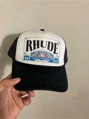 Rhude Black and White Trucker Cap with Blue and Gold Crest